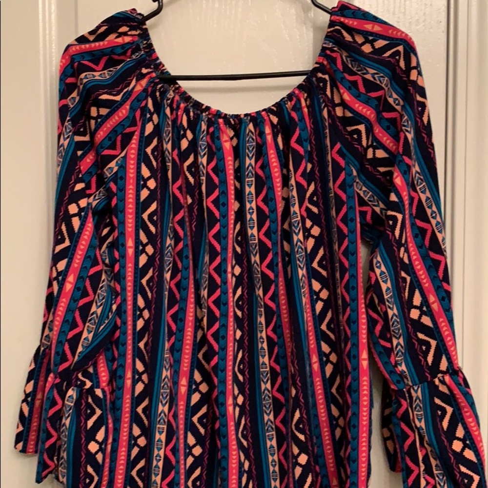 Off shoulder tunic blouse.